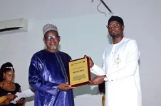 Wally sails to top honor, maritime maestro gets his due.webp