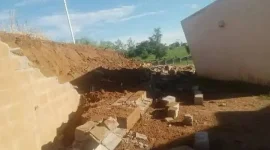 Fence falls, politics blamed for shaky build.webp