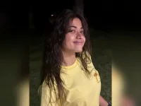 Rashmika Mandanna survives chaos with yellow and curry.webp