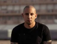 DJ Warras murder suspect charged, courts set January bail hearing.webp
