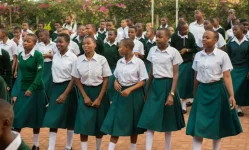 Dorms, toilets, and tampons, girls stay in school now.webp