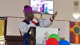 Bishop Baluku ditches drunken cheer for prayer and peace.webp