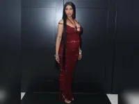 Cardi B wrangles four kids at Christmas.webp