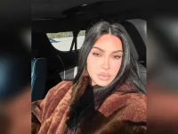 Kim Kardashian re-pierces ears at Claire’s, borrows Lorraine Schwartz bling.webp