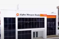 Alpha Morgan serves economic tea, no sugarcoating, just clarity.webp