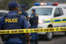 Three robbers down in the Durban shootout, two fugitives vanish into the bushes.webp