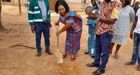 DCE Grace Asamoah kicks off 18 projects with water and chalk dust.webp