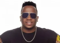 Eben dropped from a church gig over shredded jeans on the album art.webp