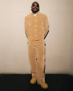 Asake closes Africa tour in a sharp tan corduroy fit.webp