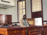 Sister of slain DJ Warras pleads for justice as accused appears in court.webp
