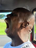 Skhinkily and his red bakkie ride to fame.webp