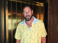 Adam Sandler roasts aging with Viagra, toenails, and eight-minute Oscar naps.webp