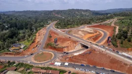 Ruto checks the road, almost done, traffic is still skeptical.webp