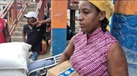 Haiti families shop again as WFP swaps handouts for vouchers.webp