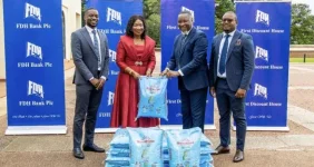 Flood-hit families eye relief as bank hands over maize.webp