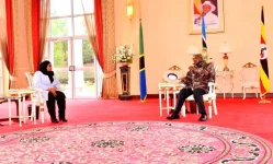 Samia cheers for Museveni after his seventh win.webp