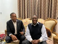 Uebert Angel shares a laugh with President Mnangagwa in Zimbabwe.webp