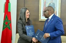 Claver Gatete and Nadia Fettah Alaoui sign Morocco hosting pact.webp