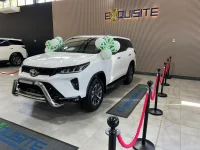 Wicknell Chivayo gifts Sunday Chidzambwa a Toyota Fortuner and cash.webp