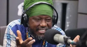 Blakk Rasta survives an armed attack during a live radio show.webp