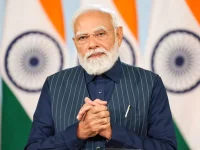 Modi heads to Assam to open a bridge, IIM, and data center.webp
