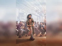 Ram Charan dances to the A R Rahman intro song.webp