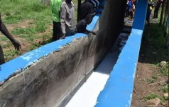 Kitgum farmers cheer Jimmy Akena Foundation dip tank fix.webp