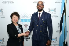 Dr. Kia Zhou meets Dr. Stephen Modise to sustain HIV gains.webp