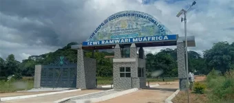 Armed youths guard Johanne Masowe's grave in Makoni.webp