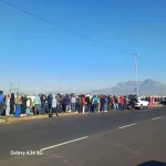 Sim Tshabalala says migrants grow South Africa's economy.webp