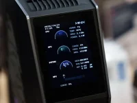 MINIX showed EU738-AI ULTRA mini PC with status screen.webp