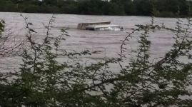 Truck Left Sinking After Engine Fails in Sudden River Surge.webp