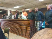 Eleven officers charged for pandemic theft.webp